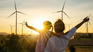 Woman Wind turbine renewable - call to action slim